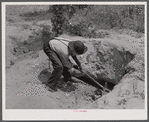 Digging for white clay which some people eat. Near Siloam, Greene County, Georgia.