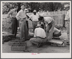 Inspecting newly-arrived chicks for the FSA (Farm Security Administration) Food for Defense program at the depot in Greensboro. Greene County, Georgia.
