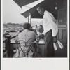 Negro waiter in Hertzog's seafood restaurant along the waterfront. Washington, D.C.
