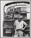 CCC (Civilian Conservation Corps) boys and trucks were used to help some of the families move out of the area being taken over by the Army in Caroline County, Virginia.