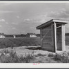 Group of prefabricated houses and privies that have been built by the FSA (Farm Security Administration) to take care of some of the white farmers who had to move out of the area taken over by the Army for maneuver grounds. Milford, Caroline County, Va.
