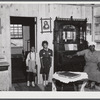 This family had to move out of the area being taken over by the Army for maneuver grounds. They now live in one of the prefabricated houses that were built by FSA (Farm Security Administration). Milford, Caroline County, Virginia.