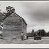 Mr. and Mrs. Russell Tombs watching the last load of their belongings go off. They are moving out of the area being taken over by the Army for maneuver grounds. Caroline County, Virginia.