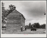 Mr. and Mrs. Russell Tombs watching the last load of their belongings go off. They are moving out of the area being taken over by the Army for maneuver grounds. Caroline County, Virginia.