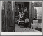 Woman and her child who must move out. The Army is taking over the area for maneuver grounds. Caroline County, Virginia.