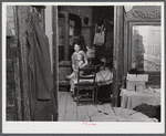 Woman and her child who must move out. The Army is taking over the area for maneuver grounds. Caroline County, Virginia.