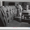 In the teletype room, where weather data and other information is constantly being received. Municipal airport, Washington, D.C..