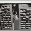 Baggage tags behind the ticket counter. Municipal airport, Washington, D.C..