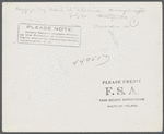 Baggage tags behind the ticket counter. Municipal airport, Washington, D.C..