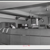 In the teletype room where weather data and other information is constantly being received. Washington D.C. municipal airport.
