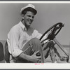 A baggage-truck driver. Washington, D.C. municipal airport.