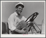 A baggage-truck driver. Washington, D.C. municipal airport.