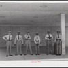 Skycaps at the entrance to the administration building. Municipal airport, Washington, D.C..