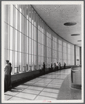 Visitors in the lobby of the municipal airport watching the planes. Washington, D.C..