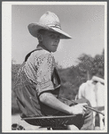 Son of Silas Butson, FSA (Farm Security Administration) client, helping to cut the hay. Athens, Vermont.