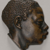 Bronze head in profile