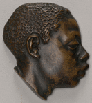Bronze head in profile