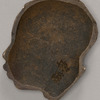 Bronze head in profile