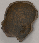Bronze head in profile