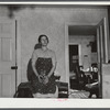 Mrs. Clifford House, whose husband has been a share-renter in the Pine Camp expansion area. They are moving out of the area and being FSA borrowers, will receive additional FSA operation assistance in making a fresh start on their new farm. Watertown, NY.