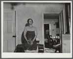 Mrs. Clifford House, whose husband has been a share-renter in the Pine Camp expansion area. They are moving out of the area and being FSA borrowers, will receive additional FSA operation assistance in making a fresh start on their new farm. Watertown, NY.