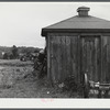 Numbers are painted on all farm building for auctioning in the area being taken over by Pine Camp. Pine Camp, New York.