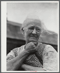 Mrs. Carrie E. Loadwick, lifelong resident of area being taken over by the Army, who is moving to the town of Adams. Leraysville, New York.