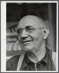 Mr. Merton Hoover, postmaster, sixty-three years old, who loses his position through the wiping out of the town of Sterlingville, New York, in the Pine Camp expansion area. He is moving to West Carthage, New York.