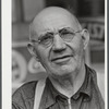 Mr. Merton Hoover, postmaster, sixty-three years old, who loses his position through the wiping out of the town of Sterlingville, New York, in the Pine Camp expansion area. He is moving to West Carthage, New York.