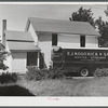 A family moving out Pine Camp expansion near Leraysville, New York.