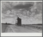 One of the many trucks to be seen carrying a farmer's belongings out of the Pine Camp expansion area. New York.