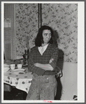 Mrs. Earl Barber is moving from the Pine Camp expansion area to nearby Evans Mills. Mrs. Barber's husband was born in this very house fifty-two years ago. Near Pine Camp, New York.