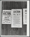 Auction notices of farms in the Pine Camp expansion area posted on a barn at the Ingalls farm near Antwerp, New York.
