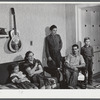 The family of Gottlieb Zahler in their new farm in Lacona, New York, to which they moved from the Pine camp relocation area. In their new home in Lacona, New York.
