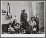 The family of Gottlieb Zahler in their new farm in Lacona, New York, to which they moved from the Pine camp relocation area. In their new home in Lacona, New York.