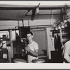 Taking samples of milk for testing at the United Farmers' Cooperative Creamery at East Berkshire, Vermont.