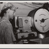 Weighing the milk at the United Farmers' Co-op Creamery in East Berkshire, Vermont.