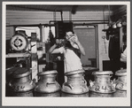 Taking samples of milk for testing at the United Farmers' Co-op Creamery in East Berkshire, Vermont.
