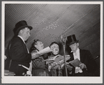 The quartet sings a selection at an old-fashioned musical at the "World's Fair" in Tunbridge, Vermont.