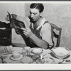 William Gaynor gets several farm journals at his home near Fairfield, Vermont.