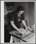 Mrs. Gaynor making doughnuts on her farm near Fairfield, Vermont.