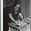 Mrs. Gaynor making doughnuts on her farm near Fairfield, Vermont.