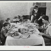 The Gaynor family at dinner on their farm. Fairfield, Vermont.