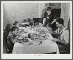 The Gaynor family at dinner on their farm. Fairfield, Vermont.