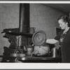 Mrs. W. Gaynor preparing dinner on their farm near Fairfield, Vermont.