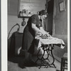 Mrs. Gaynor doing her ironing on their farm. Fairfield, Vermont.