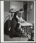 Mrs. Gaynor doing her ironing on their farm. Fairfield, Vermont.