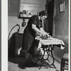 Mrs. Gaynor doing her ironing on their farm. Fairfield, Vermont.