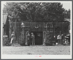 Visitors at the antique house at the World's Fair at Tunbridge, Vermont.