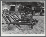 Exhibit of old ploughs and antique buggies at the World's Fair at Tunbridge, Vermont.